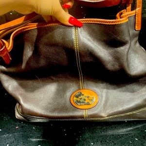 Dooney and Bourke vintage bag . Minor scratches but overall good condition